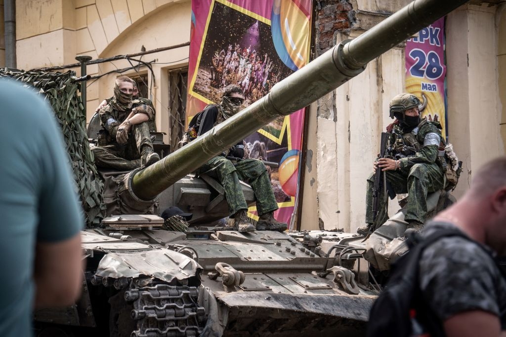 Members of the Wagner Group sit atop a tank in Rostov-on-Don, Russia, on June 24, 2023. 