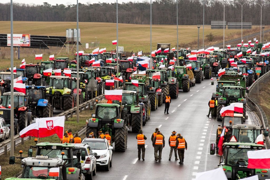 Polish farmers with tractors and vehicles block roads during a demonstration against the import of Ukrainian grain in Sulechow, Poland, on Feb. 20, 2024. 