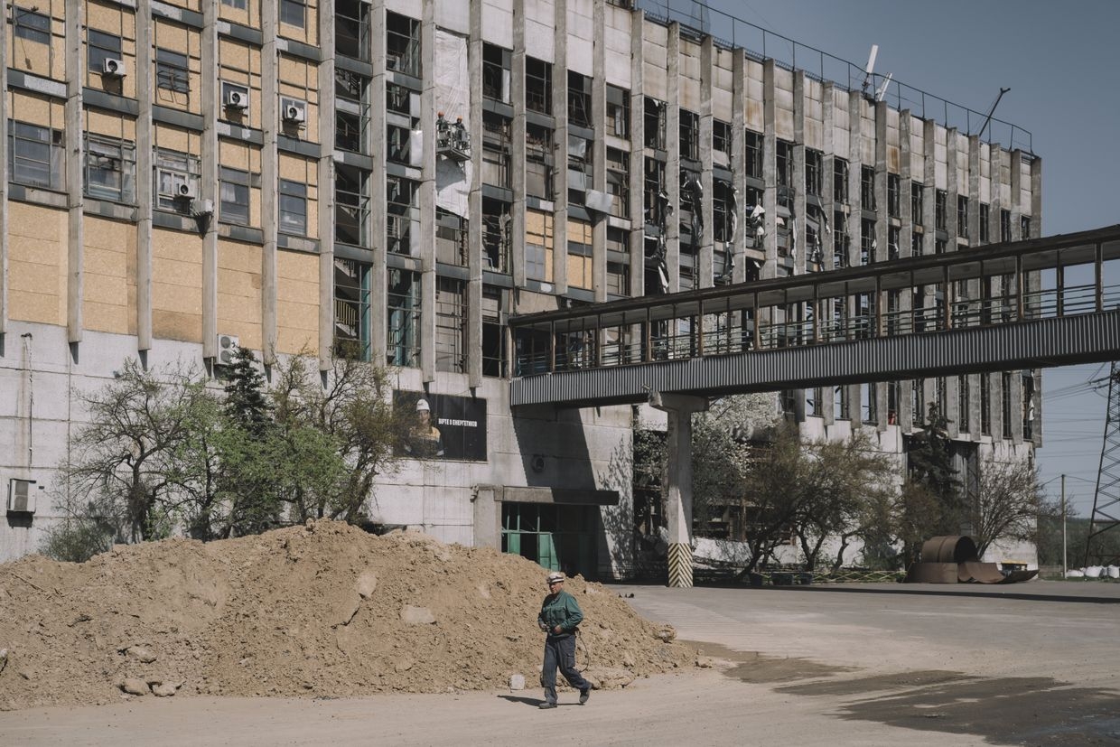A worker outside a thermal power plant, extensively damaged after a Russian missile attack, at an undisclosed location, in Ukraine, on April 12, 2024. 