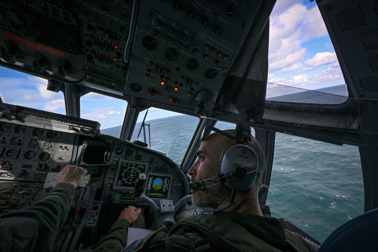 French Navy personnel operate an ATL2 Atlantique 2 airplane over the Black Sea off Constanta, Romania, on March 30, 2023. 