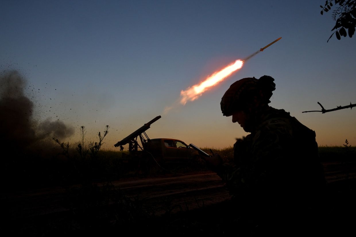 An artilleryman from the special unit Streletskyi Battalion of the Zaporizhzhia police fires a shot from a Partizan rocket launcher near Orikhiv, Zaporizhzhia Oblast, Ukraine, on May 23, 2025. 