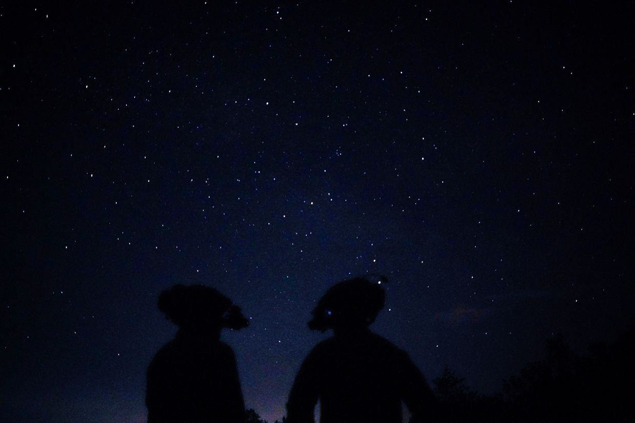 Special Forces fighters of the Ukrainian Defence Forces conduct a night training mission in Ukraine on June 2025. 