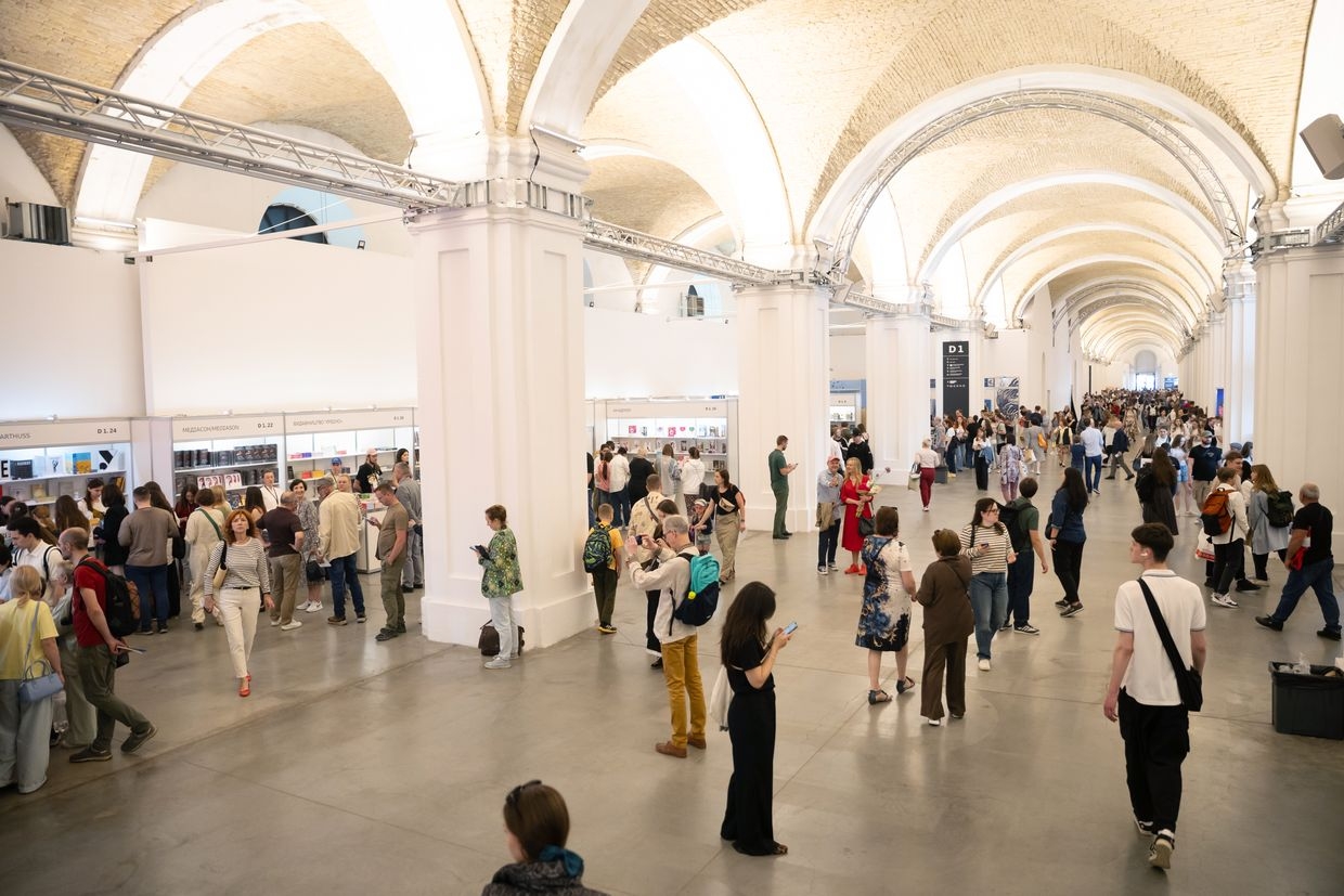 People attend the 13th International Book Arsenal Festival in Kyiv, Ukraine, on May 31, 2025. 