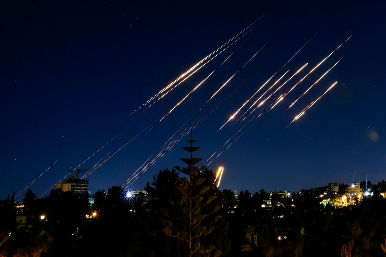 Missiles fired from Iran are pictured in the night sky over Jerusalem, Israel, on June 14, 2025.