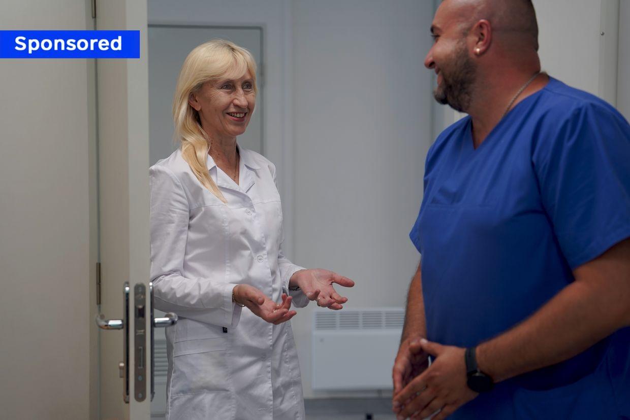 Nataliia Kotova (L), a gynecologist from Kurakhove, in Pereshchepyne, Dnipropetrovsk Oblast, Ukraine