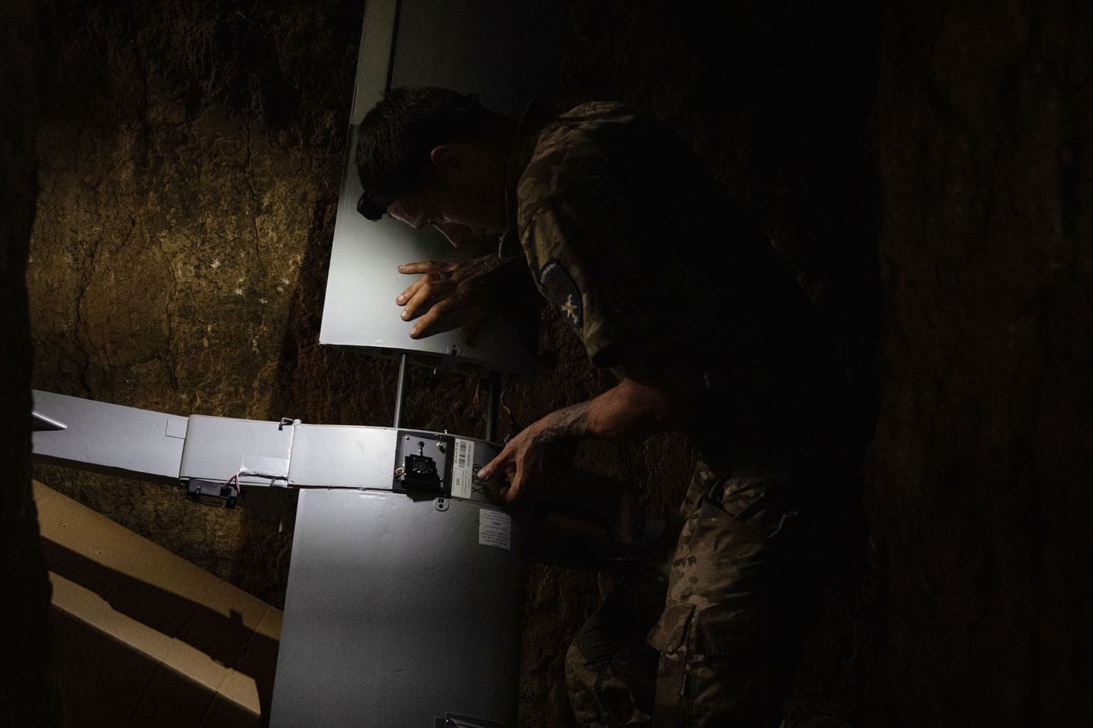 Tsyhan assembles a Dart in the Lyman sector, Ukraine, on Aug. 11, 2026.