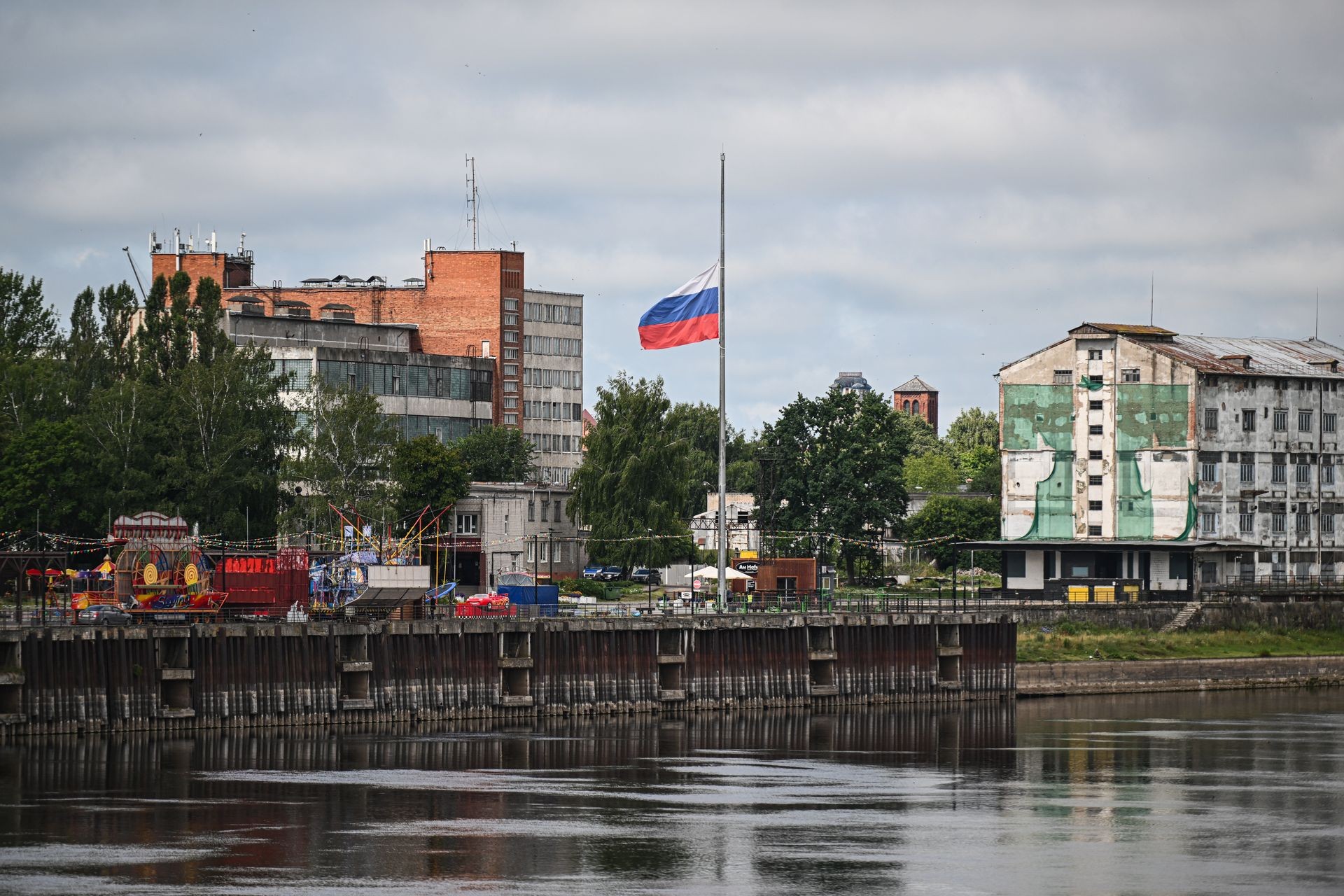 A Russian flag is seen from Pagegiai, Lithuania, separated by the river from the Kaliningrad Oblast, on July 10, 2023.