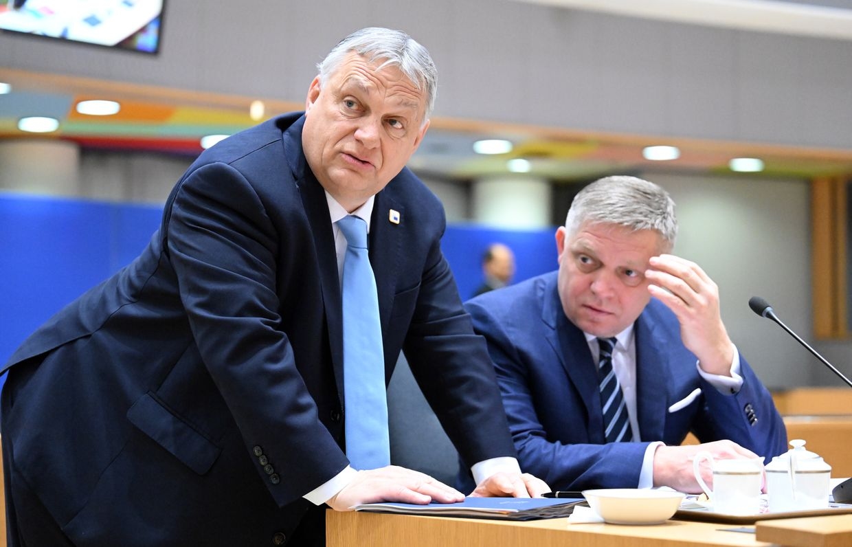 Prime Minister of Slovakia Robert Fico (R) and Prime Minister of Hungary Viktor Orban (L) attend a session on the second day of the EU Leaders Summit in Brussels, Belgium on March 22, 2024.