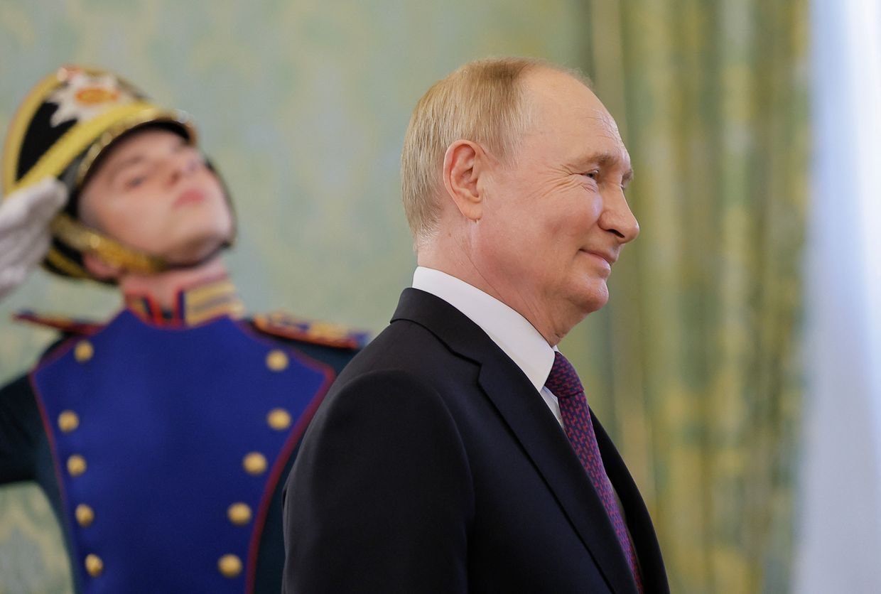 Vladimir Putin walks past an honour guard at the Kremlin in Moscow on July 31, 2024. (Maxim Shemetov / POOL / AFP via Getty Images)
