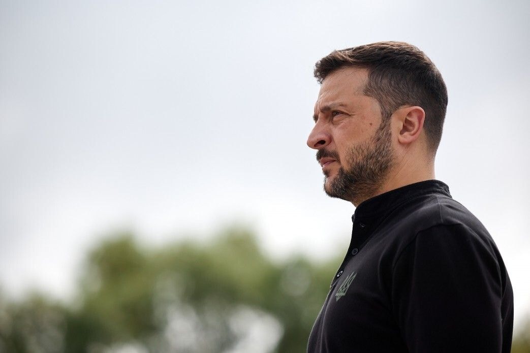 President Volodymyr Zelensky delivers a speech on the stand in front of the first General Dynamics F-16 Fighting Falcon received by Ukraine, congratulating the Ukrainian military on Aug. 4, 2024. (Ukrainian Presidency/Handout/Anadolu via Getty Images)