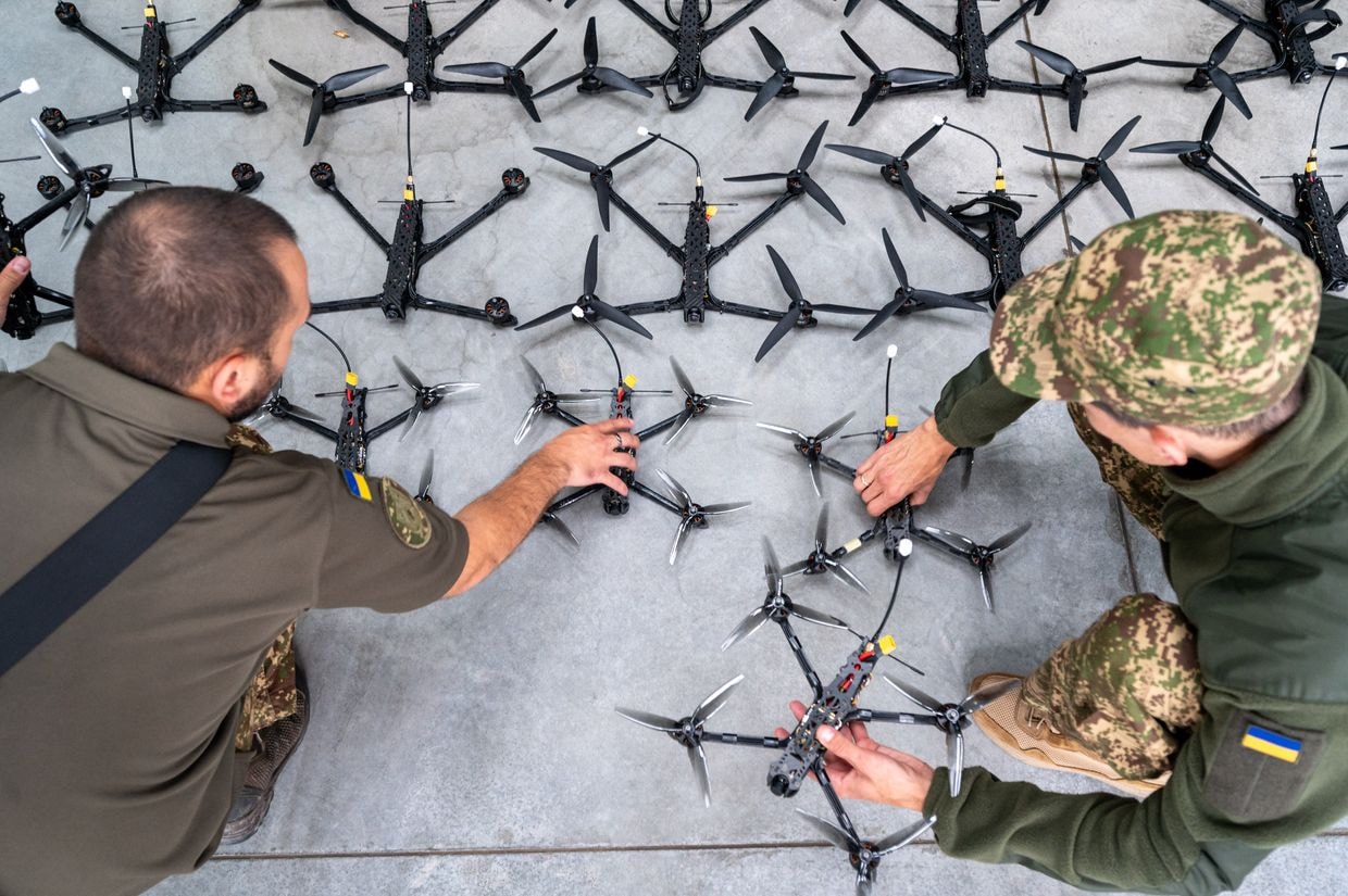 Soldiers of the Armed Forces inspect FPV drones during the handover from the volunteer organization in Lviv, Ukraine, on Sep. 13, 2024. (Stanislav Ivanov / Getty Images)