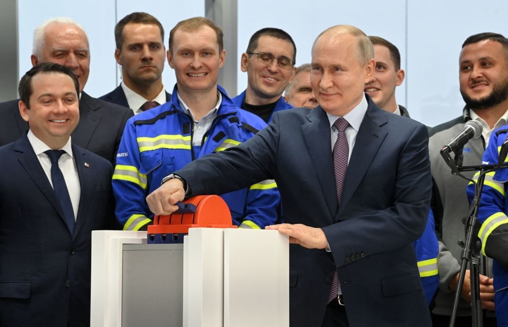 Russian President Vladimir Putin launches the first natural gas liquefaction line on a gravity-type base for the Arctic LNG-2 project in Murmansk Oblast, Russia on July 20, 2023.