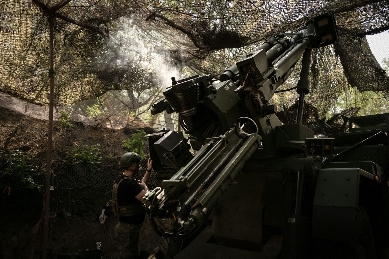 A soldier adjusts the aim of a Caesar self-propelled gun near the eastern front line of Ukraine, on June 9, 2025. (Florent Vergnes / AFP via Getty Images)