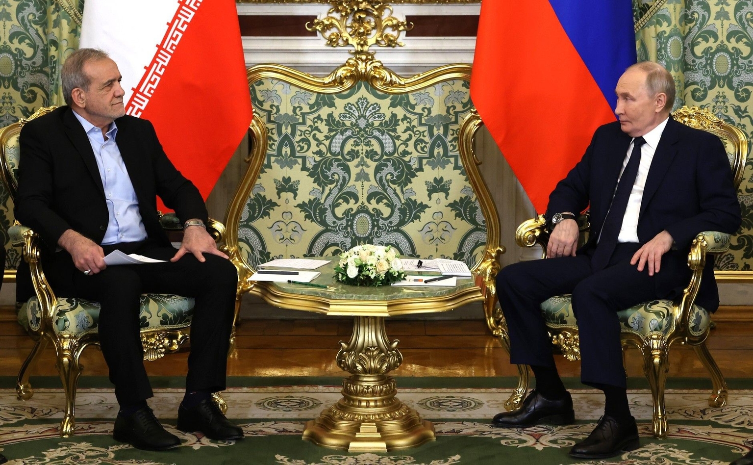 Russian President Vladimir Putin (R) meets with Iranian President Masoud Pezeshkian (L) in Moscow, Russia, on Jan. 17, 2025.