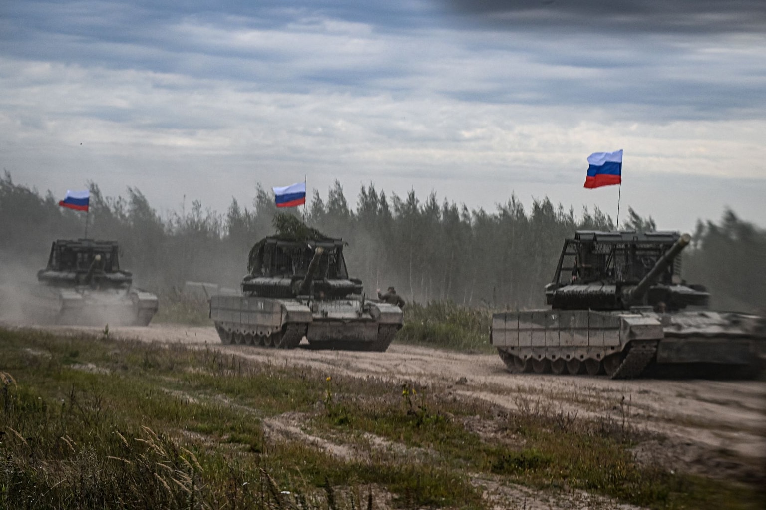 Russian tanks move during the "Zapad-2025" (West-2025) joint Russian-Belarusian military drills at a training ground near the town of Borisov, east of the capital Minsk, on September 15, 2025. (OLESYA KURPYAYEVA/AFP via Getty Images)