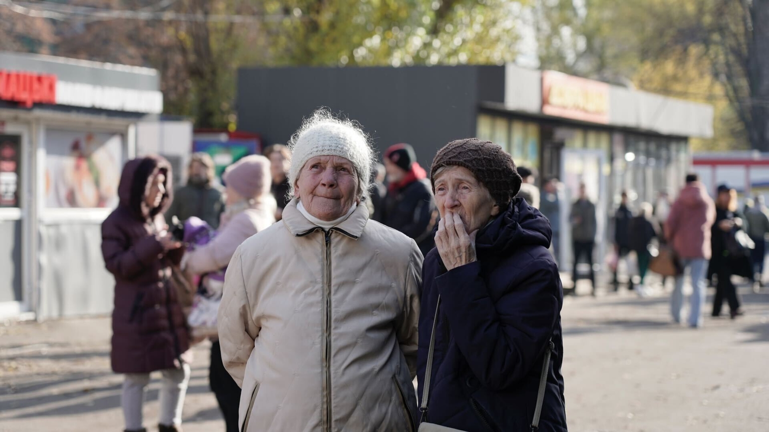 Kyiv residents at the sight of Russia's overnight drone and missile attack on Kyiv, Ukraine, on Nov. 14, 2025.