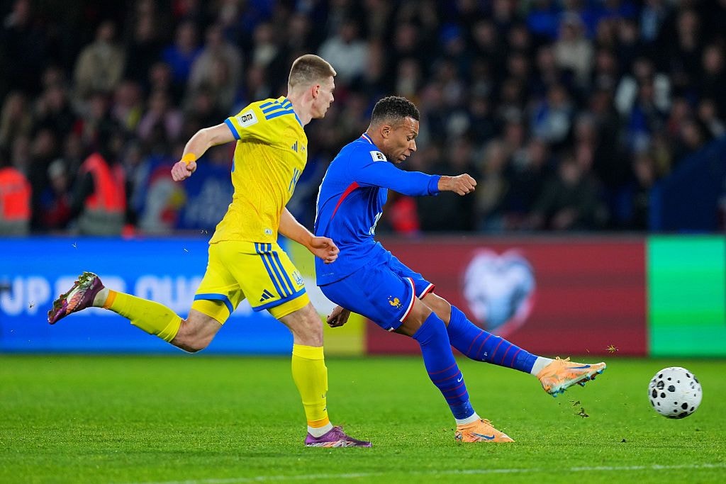 Kylian Mbappe of France crosses the ball during the FIFA World Cup 2026 qualifier match between France and Ukraine at Parc des Princes on Nov. 13, 2025 in Paris, France. (Franco Arland/Getty Images)