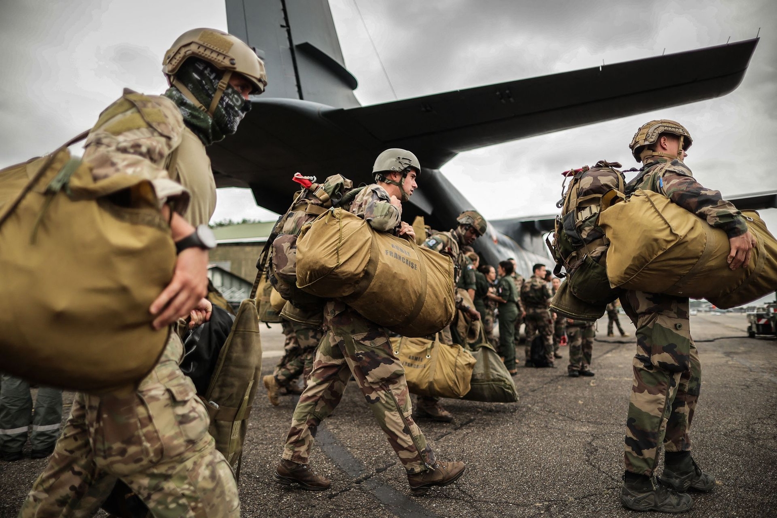 French soldiers from the 1st Parachute Fighter Regiment of Pau board a French Airbus A400M during a French Air Force training exercise at Mont-de-Marsan Air Base in Mont-de-Marsan, France, on Oct. 6, 2022.