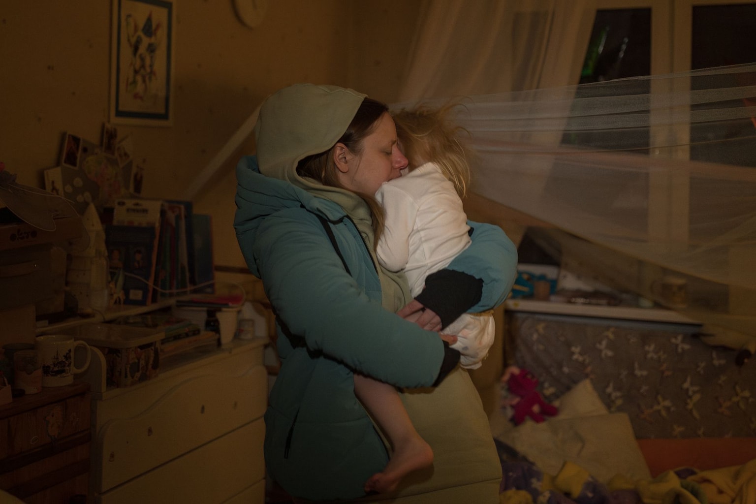 As Russia tries to freeze Ukrainians to submission, families try everything to stay warm