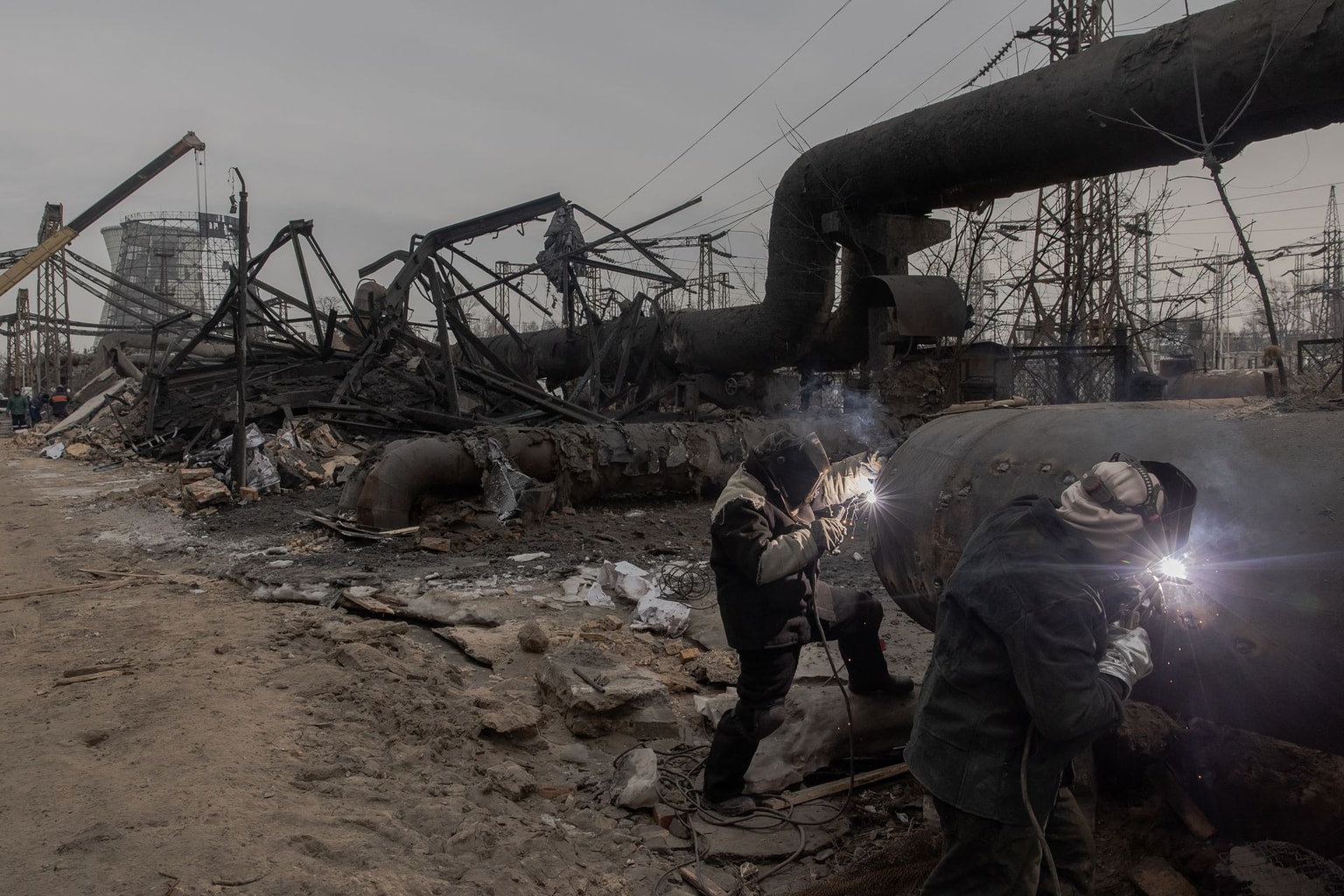 Employees repair sections of heat and power plant damaged by Russian air strikes in Kyiv, Ukraine, on Feb. 4, 2026.
