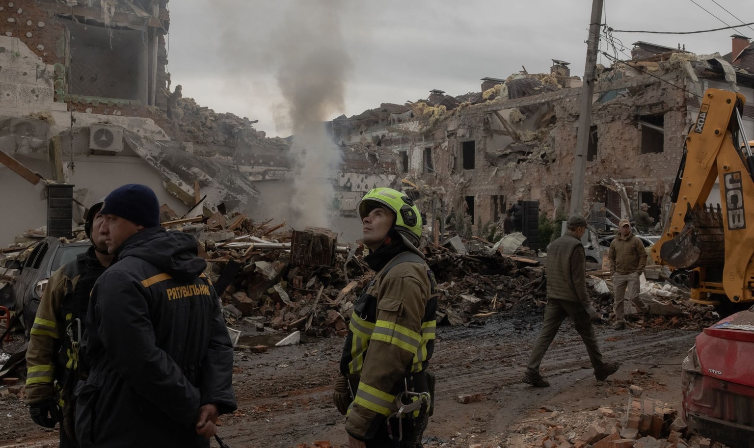 Ukrainian rescuers following a Russian air attack in Kyiv, Ukraine, on Sept. 28, 2025.