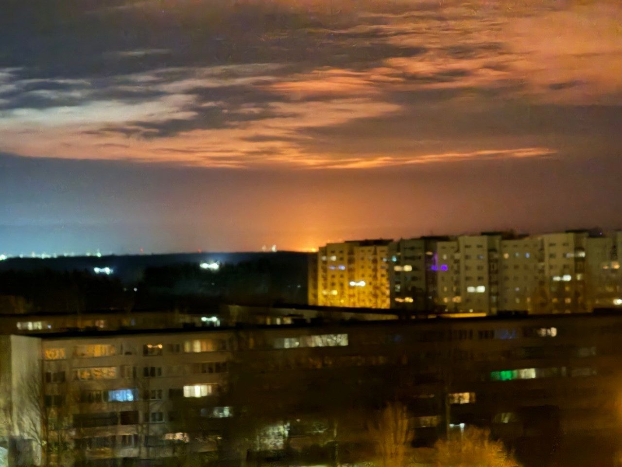 A fire is seen purportedly seen emanating from an oil terminal in the city of Ust-Luga in Russia's Leningrad Oblast overnight on March 27, 2026 following a Ukrainian drone attack on the region. (Supernova+/Telegram)