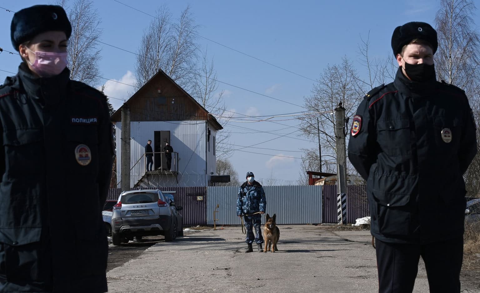 Russian police officers guard the entrance to Penal Colony No. 2 in Pokrov, Russia, on April 6, 2021.
