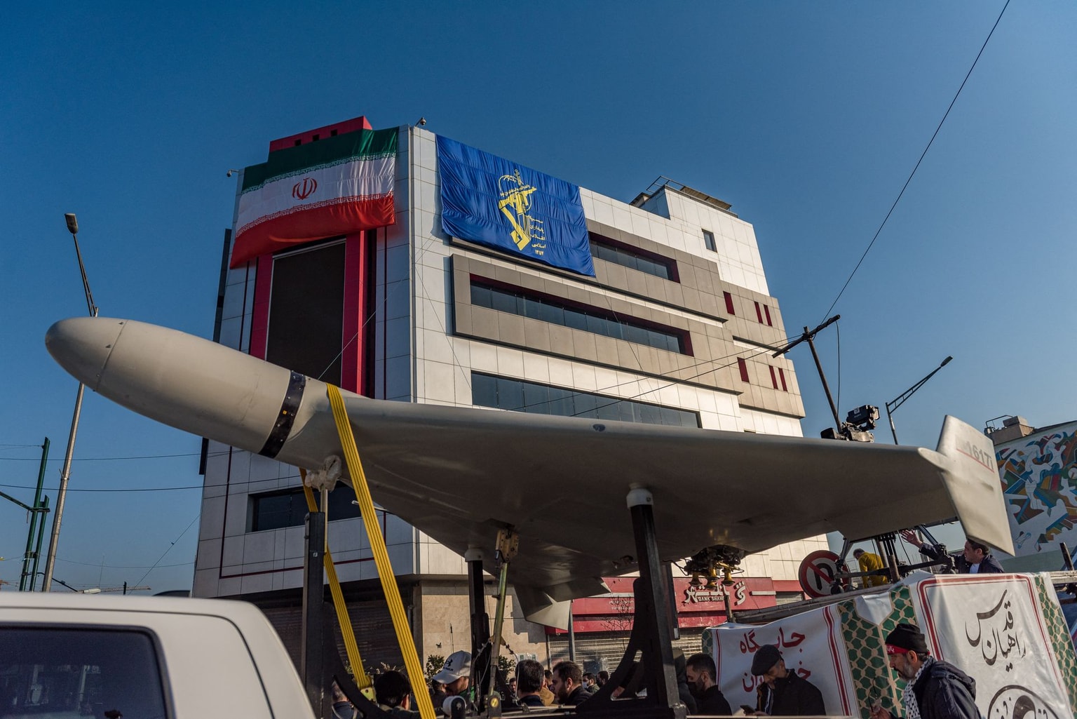 A Zamyad pick-up truck carries an Iranian made Shahed 136 drone during a parade in downtown Tehran, Iran, on January 10, 2025. (Hossein Beris / Middle East Images / Middle East Images via AFP)