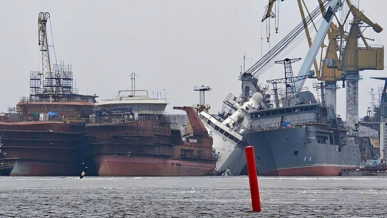 A photograph purportedly showing a Russian military icebreaker keeled over after being damaged by a Ukrainian drone strike on Vyborg, Russia, on the morning of March 25, 2026. (Telegram)