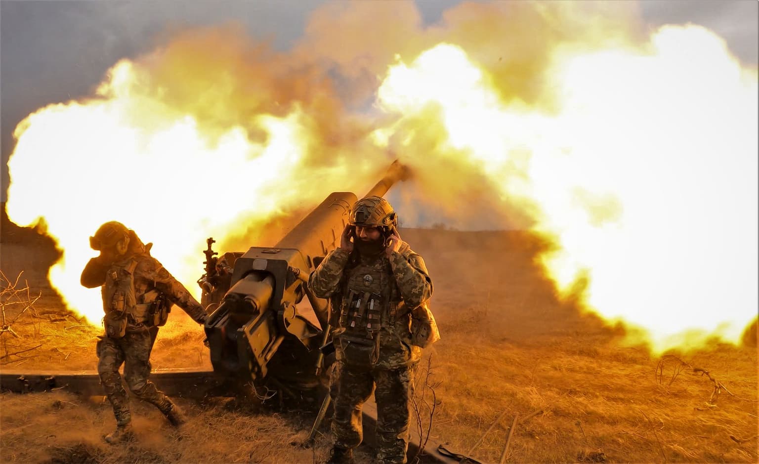 Ukrainian servicemen firing toward Russian positions near Bakhmut, Donetsk Oblast, Ukraine, on March 21, 2023.