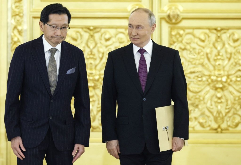 Illustrative image: Japan's Ambassador to Russia Akira Muto (L) stands with Russian President Vladimir Putin (R) in Moscow, Russia, on Nov. 5, 2024. (Yuri Kochetkov / Pool / AFP via Getty Images)