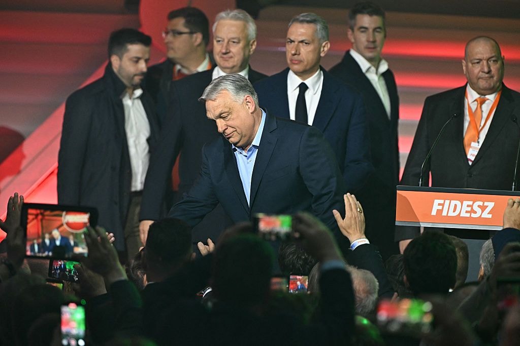Hungary's Prime Minister Viktor Orban greets supporters at the Balna centre in Budapest during a general election in Hungary, on April 12, 2026. (Attila Kisbenedek /AFP via Getty Images)