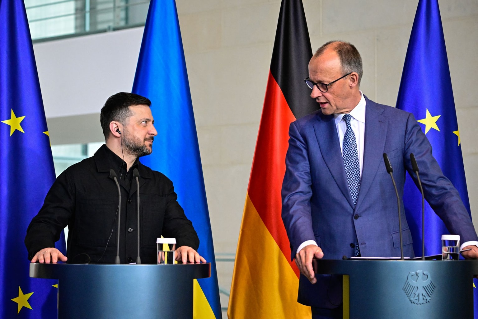 German Chancellor Friedrich Merz (R) and President Volodymyr Zelensky in Berlin on April 14, 2026. (Tobias Schwarz / AFP via Getty Images)