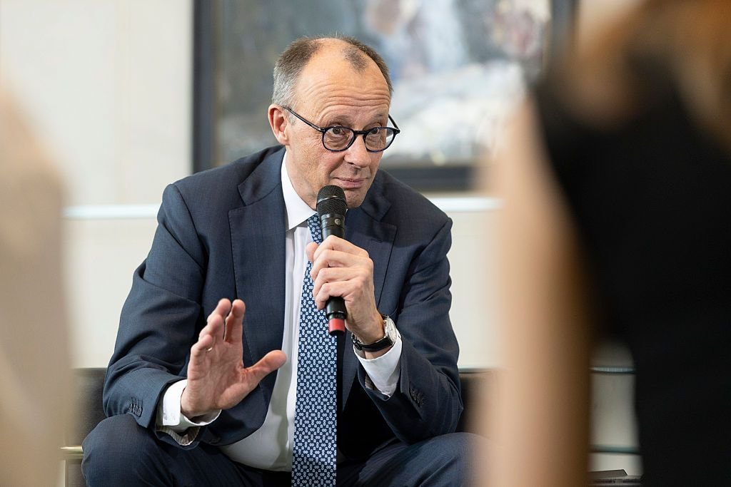 German Chancellor Friedrich Merz chats with high school students during the annual Girls' Day event at the Chancellery in Berlin, Germany on April 22, 2026. (Maja Hitij/Getty Images)