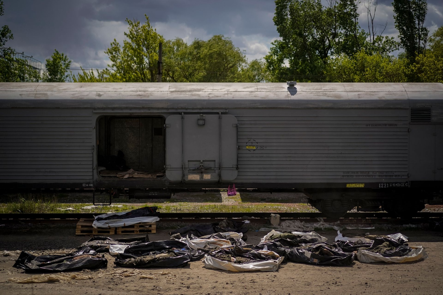 Bodies of dead Russian soldiers lay on the floor during an identification process in Kharkiv, Ukraine, on May 17, 2022.
