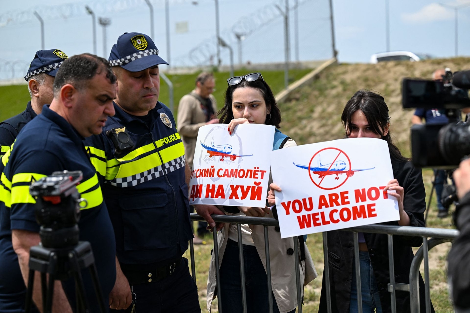 Demonstrators protest against the resumption of air links with Russia outside Tbilisi Airport in Tbilisi, Georgia, on May 19, 2023