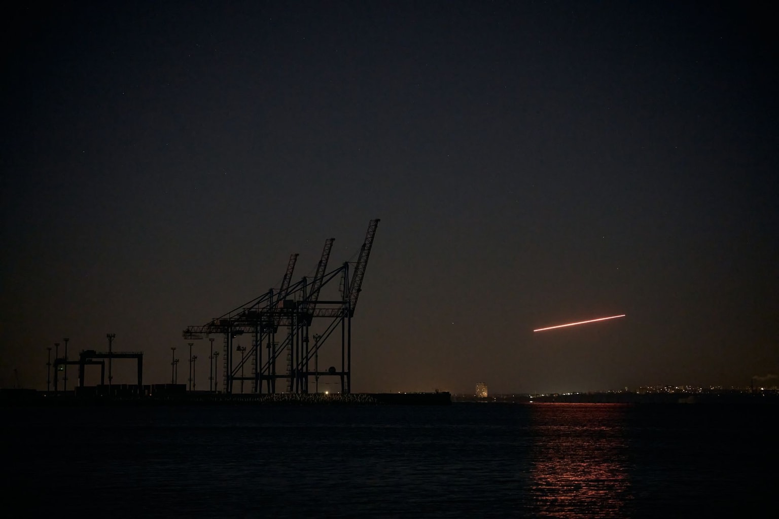 Illustrative image: Russian Shahed-type drones attack the area near the port of Odesa during an overnight air assault, as air defense systems engage incoming targets amid Russia's ongoing invasion of Ukraine, on Jan. 1, 2026, in Odesa, Ukraine. (Kostiantyn Liberov/Libkos/Getty Images)