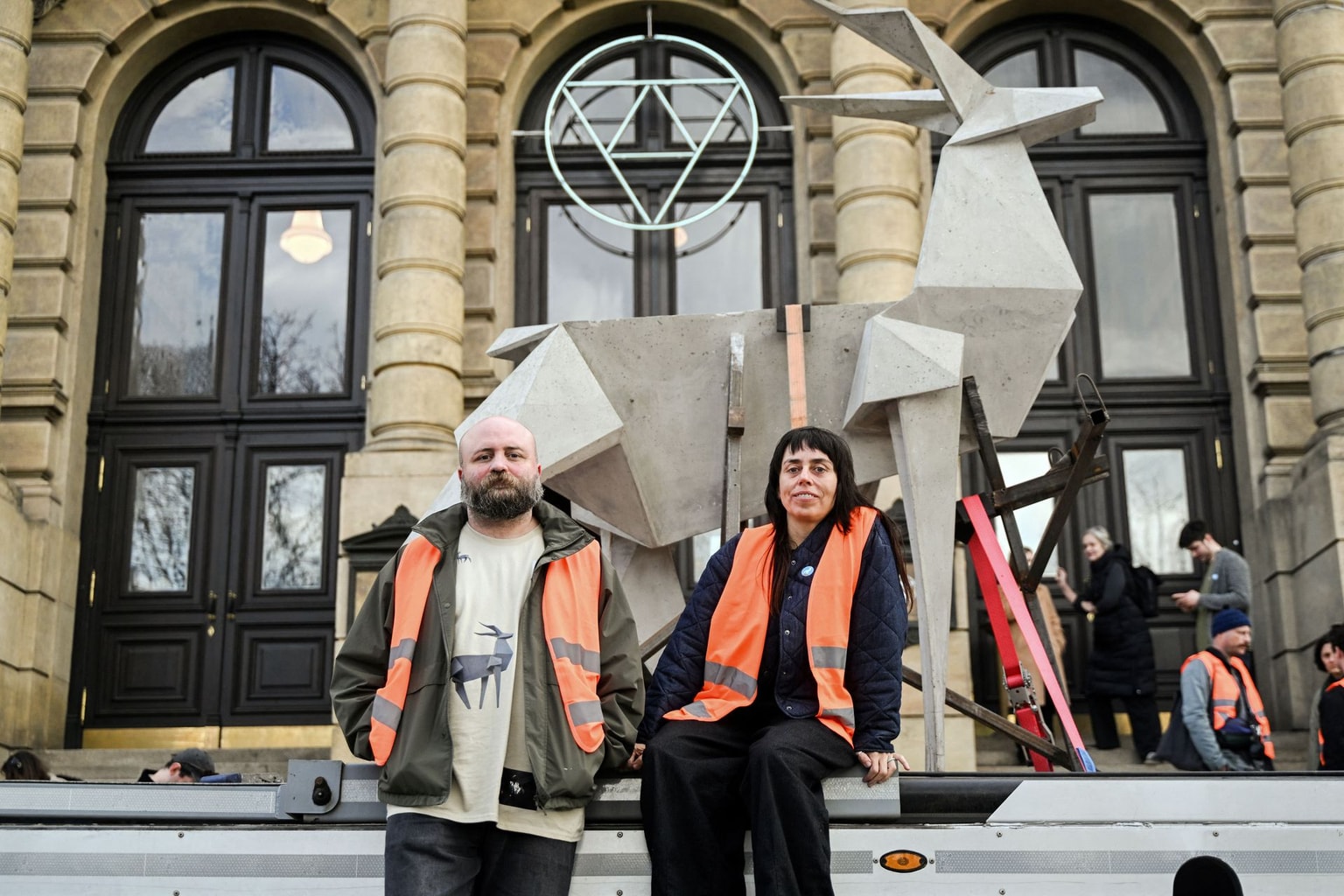 Artist Zhanna Kadyrova (R) and curator Leonid Marushchak pose with the "Origami Deer" sculpture in Prague on March 12, 2026.