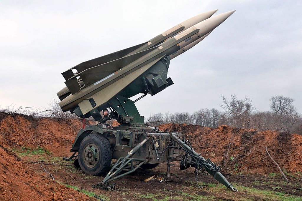 A serviceman of the 208th Kherson Anti-Aircraft Missile Brigade, which performs air defense missions in the southern direction, stands on combat duty near a launcher of the MIM-23 Hawk surface-to-air missile system in Mykolaiv Oblast, Ukraine, on March 30, 2026. (Nina Liashonok/Ukrinform/NurPhoto/Getty Images)