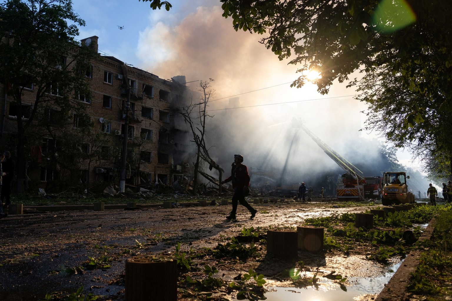An emergency responder works at the site of a heavily damaged building in Kyiv, Ukraine, on May 24, 2026.