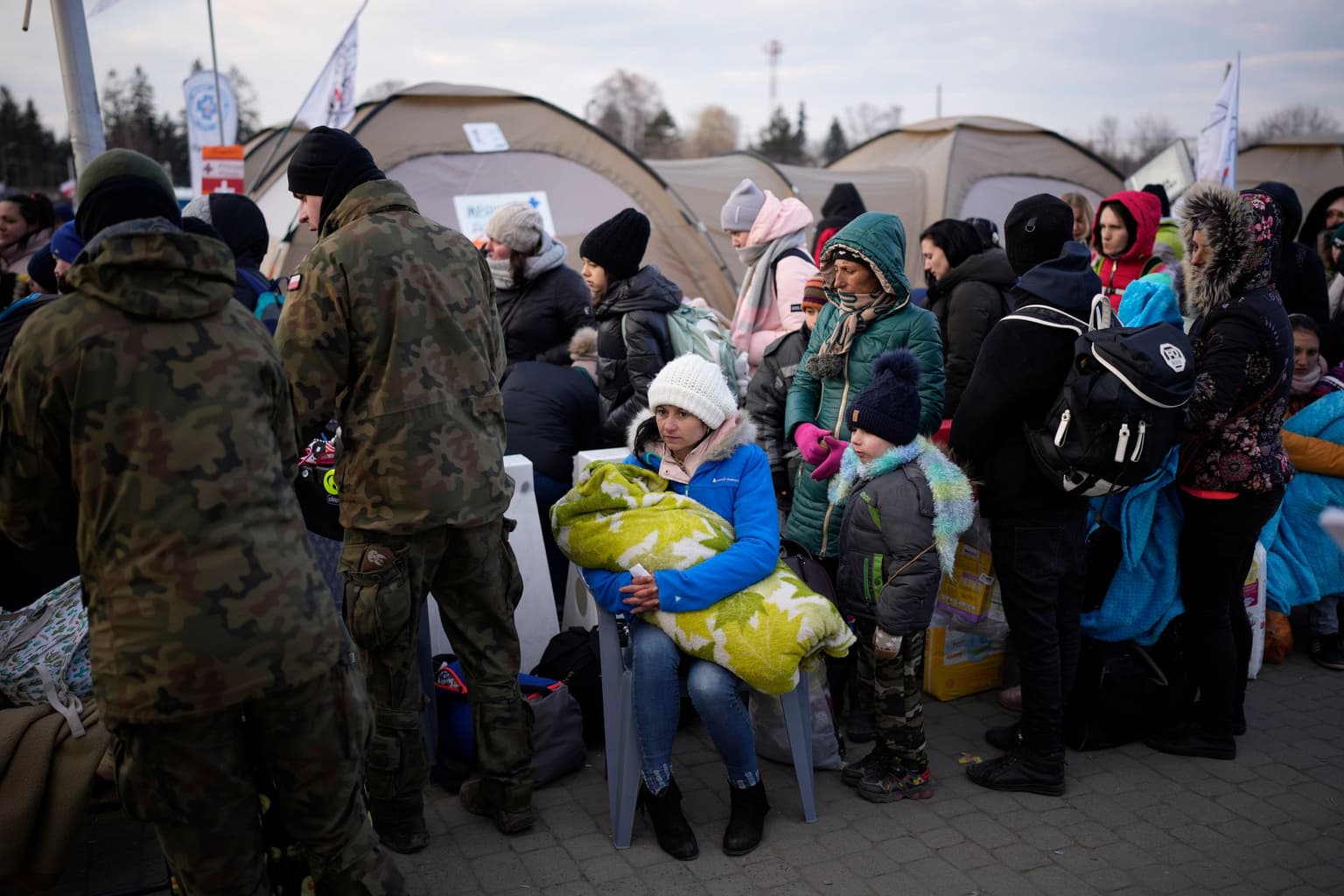 Ukrainian refugees arrive at the Medyka border crossing in Poland on March 10, 2022.
