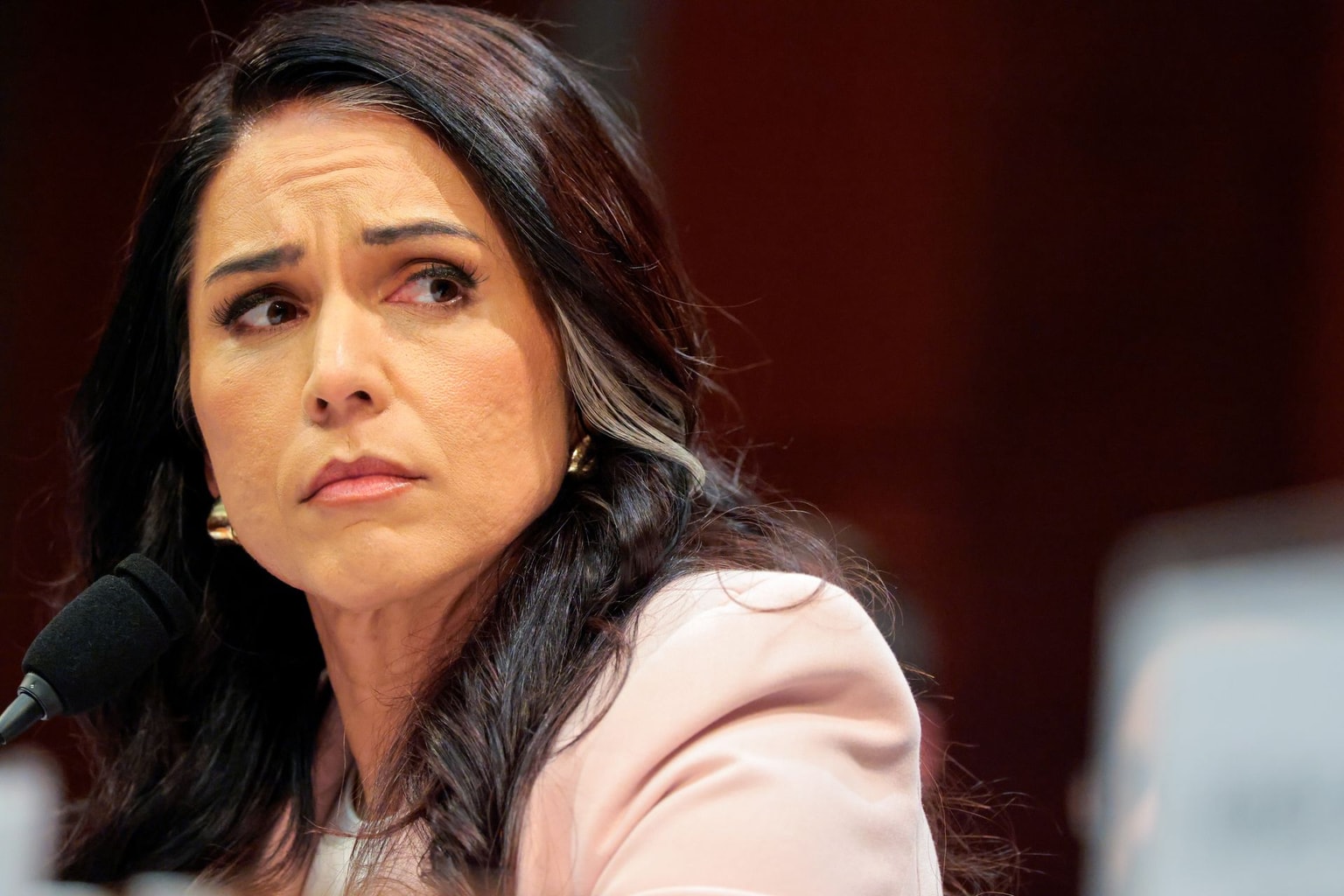 Tulsi Gabbard testifies during a House Select Intelligence Committee hearing in Washington, D.C., U.S. on March 19, 2026.
