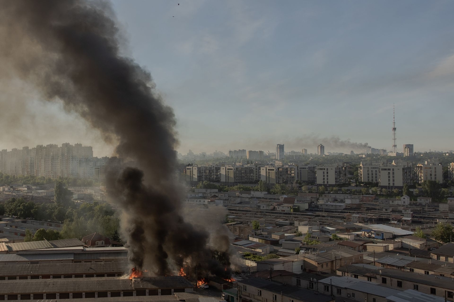 Smoke rises from places damaged during Russian missile and drone strikes in Kyiv, Ukraine, on June 2, 2026.