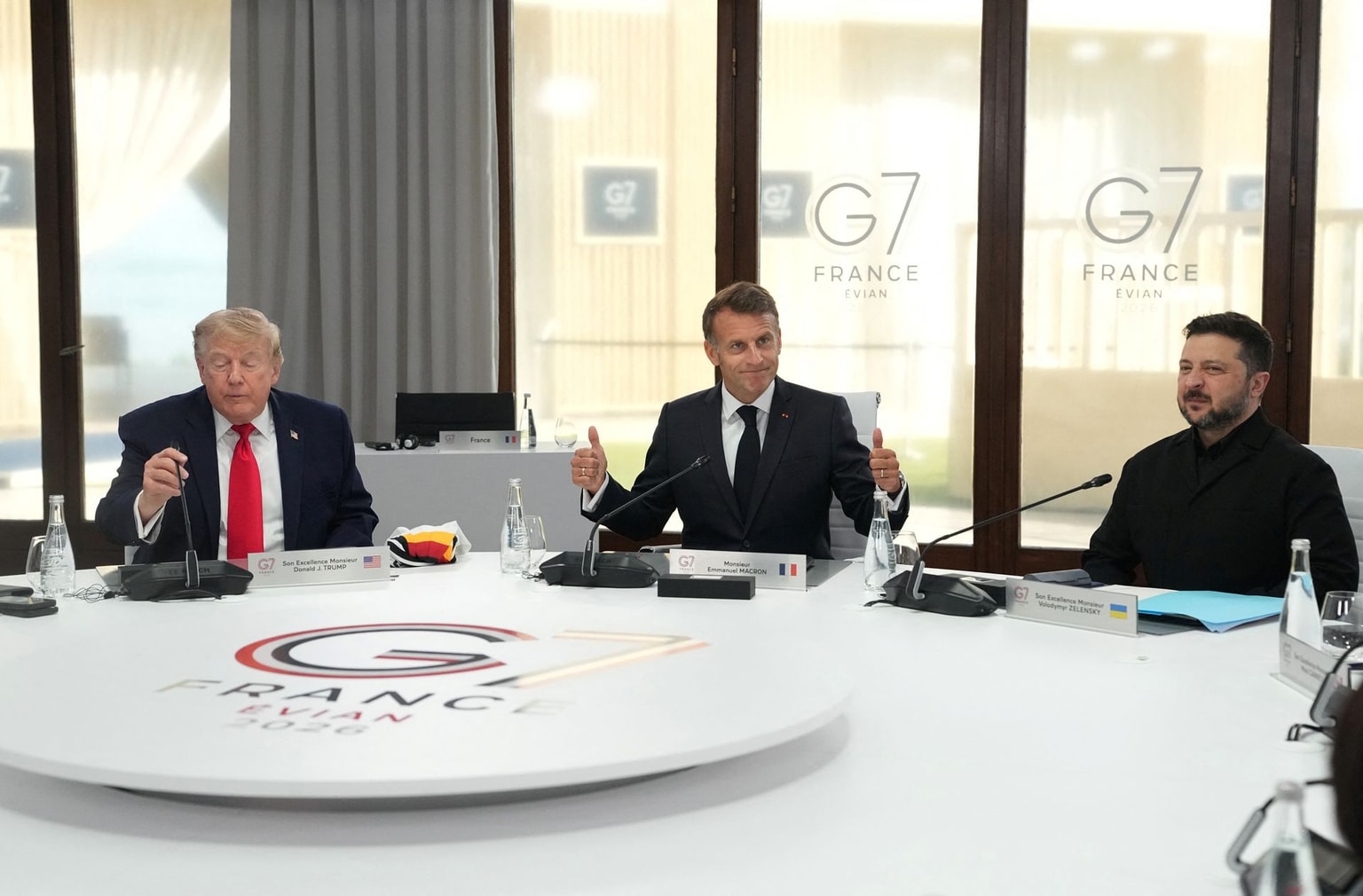 U.S. President Donald Trump, France's President Emmanuel Macron, and President Volodymyr Zelensky in Evian-les-Bains, central-eastern France, on June 16, 2026. (Thibault Camus / POOL / AFP via Getty Images)