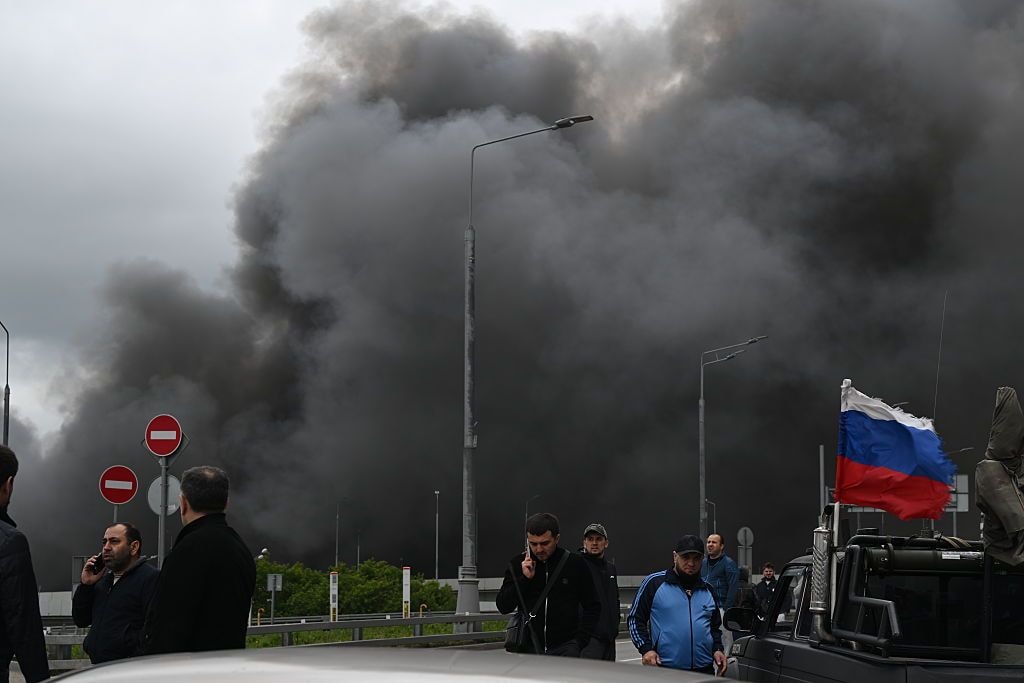 Black smoke billows from the area of the Moscow Oil Refinery on June 18, 2026, following a large-scale Ukrainian drone attack on the Russian capital. (Sefa Karacan/Anadolu via Getty Images)
