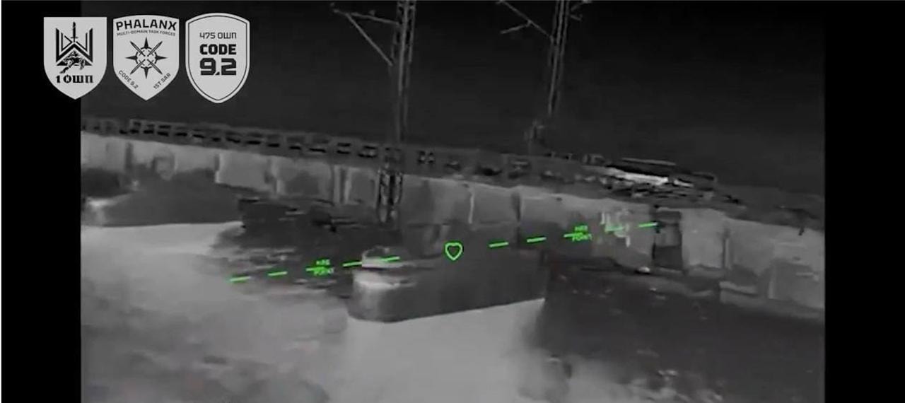 A screenshot from video released by Ukraine's 1st Separate Assault Regiment Da Vinci and the 475th Separate Assault Brigade CODE 9.2 on June 13, 2026, showing a strike on a crossing near Chonhar connecting occupied Crimea with Russian-held territory in southern Ukraine. (Telegram)