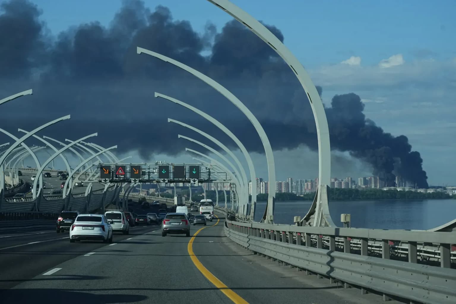 A plume of black smoke rises over the port of Saint Petersburg, Russia, following a Ukrainian drone attack on June 3, 2026.