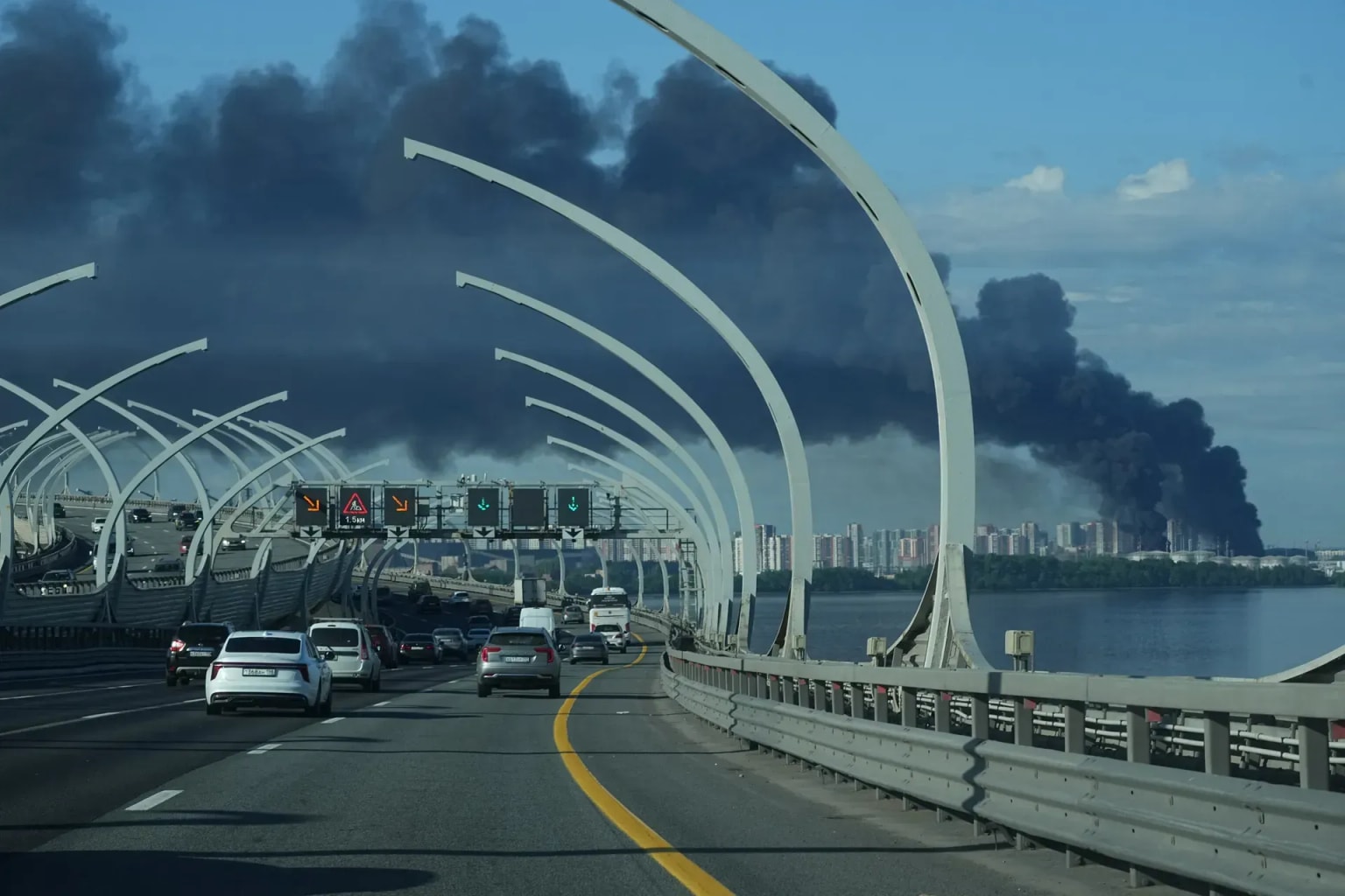 A plume of black smoke rises over the port of Saint Petersburg, Russia, following a Ukrainian drone attack on June 3, 2026.