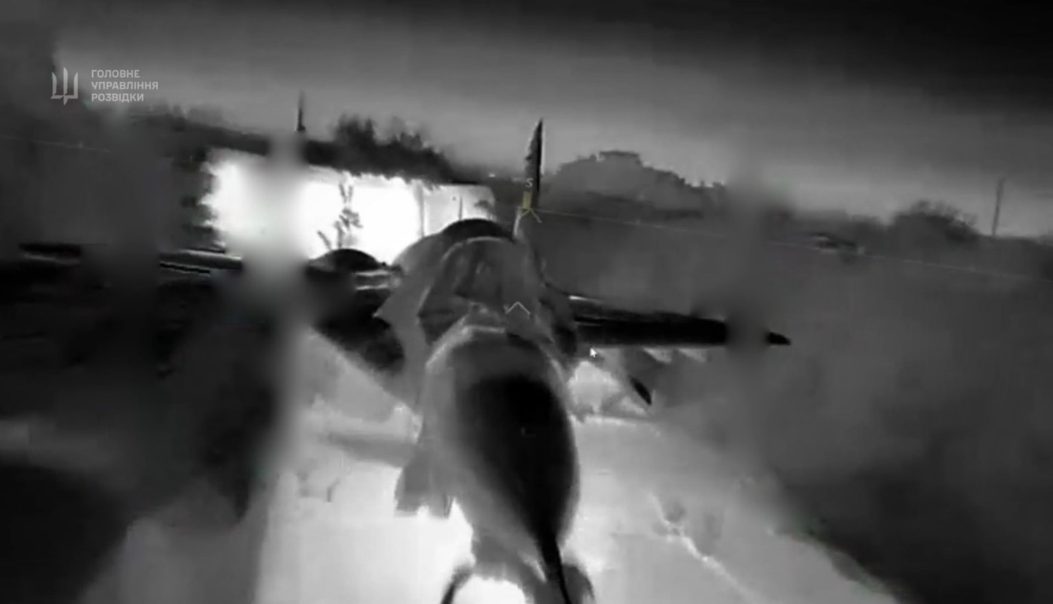 A screenshot from a video released by HUR on July 4 showing a Ukrainian drone strike on a Russian MiG-29 fighter aircraft in occupied Crimea (HUR/Telegram)
