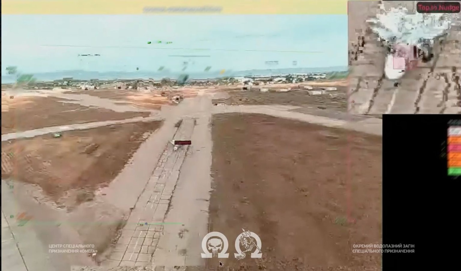 A screenshot from footage released by Ukraine's Omega special forces that shows a drone approaching a Russian Su-24M bomber at the Saky air base in occupied Crimea. (Omega Special Forces / Telegram)